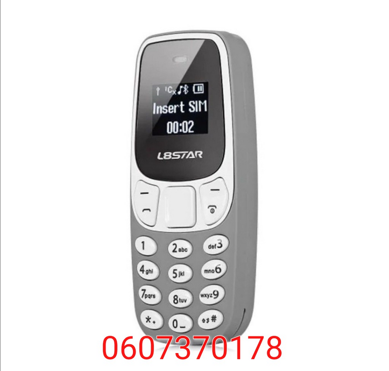 BM10 Wireless Dialer/ Super Mini Cellphone Grey Colour (Brand New)