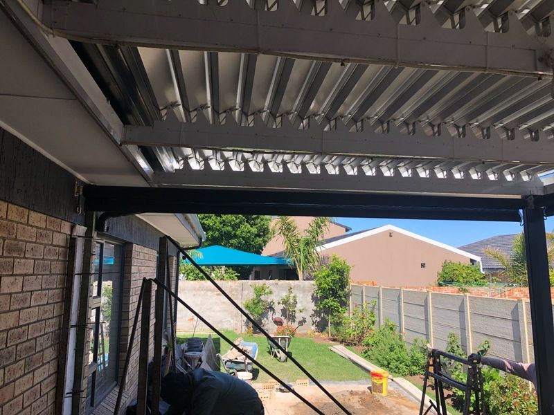 2 x patio Gear operated drop blinds.