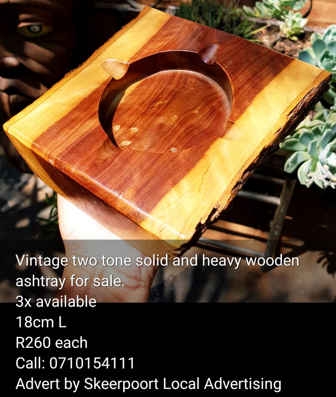 Vintage two tone heavy and solid wooden ashtray for sale.