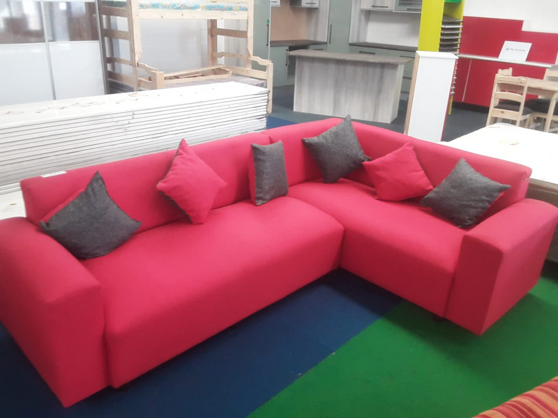 Red L shape couch