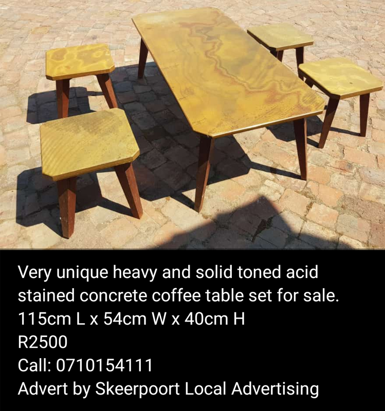 Very unique heavy and solid toned acid stained concrete coffee table set for sale