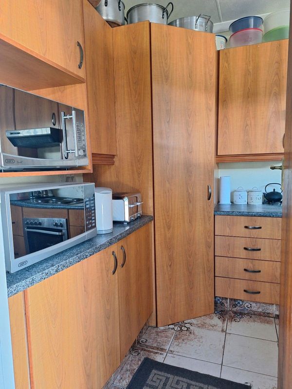 Kitchen Cupboards including Door Handles and Counter Tops