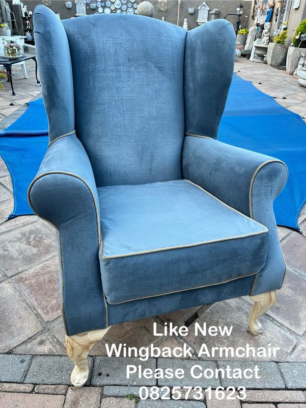 Wingback armchair like new in greyish blue velvet fabric with gold trim excellent delivery