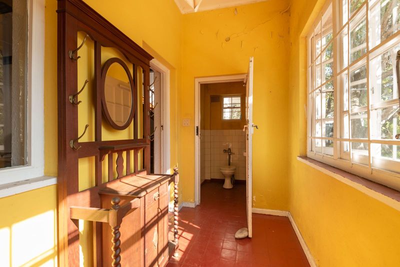 Experience the nostalgia of a bygone era - Fixer Upper with Restoration Potential.