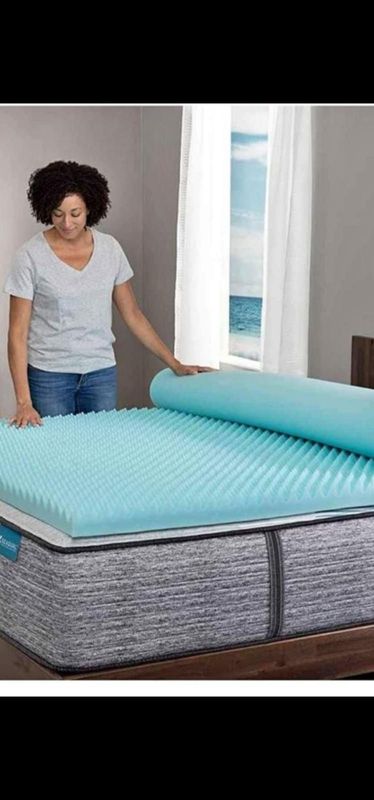 Convulated mattress topper