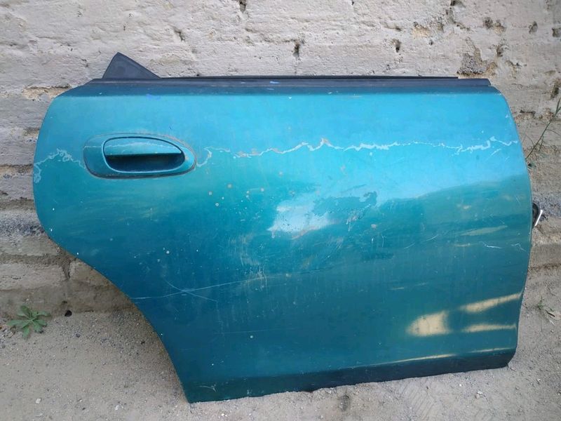 Mazda Astina right rear / back door with mechanism and lock
