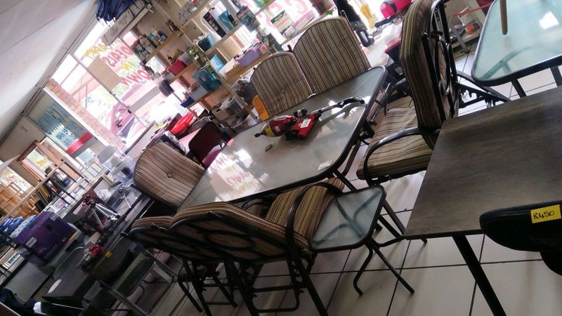 Patio set with glass side table and 2 foot rests
