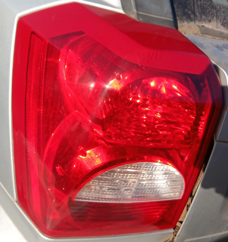 DODGE CALIBER LEFT REAR TAILLIGHT , CONTACT FOR PRICE