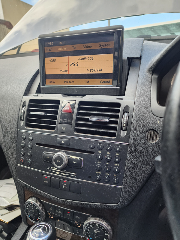 2009 Mercedes-Benz C class Harman radio &amp; folding screen.