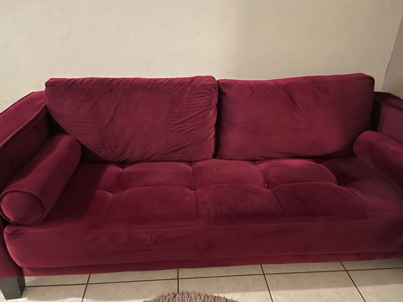 2.5 seater Rochester Couch - ruby red in colour with a velvet mater