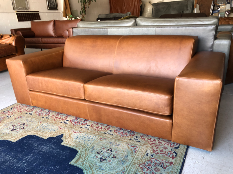 Brand new 2.2m TITANIC STYLE  genuine leather three seater couch. (A BOLD &amp; MODERN DESIGN)