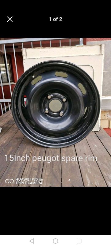 15inch steel rims. 4 hole