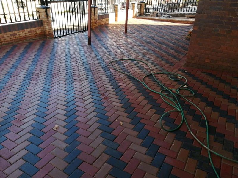 Brick paving and tar surfacing