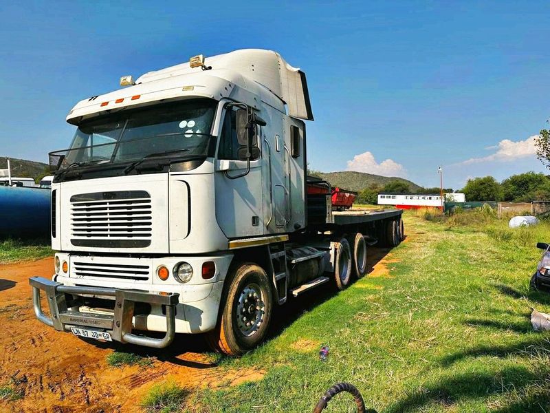 April Combo Special! 2011 Freightliner Argosy CISX 500 &amp; a 2000 model Tri-Axle Trailer