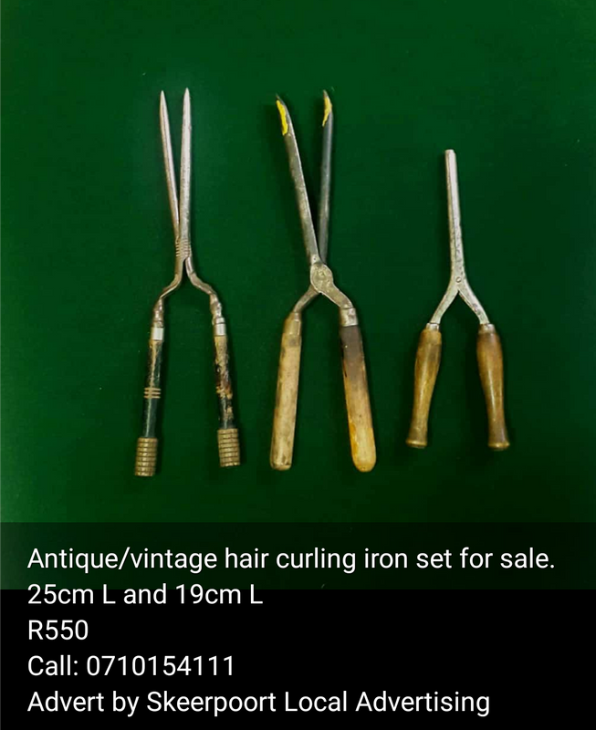 Vintage/Antique hair curling iron set for sale.