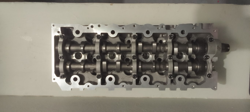 THE CYLINDER HEAD IS BARE FOR TOYOTA HILUX 2.5 D4D [2KD] AND IS AVAILABLE IN STOCK CONTACT ME.