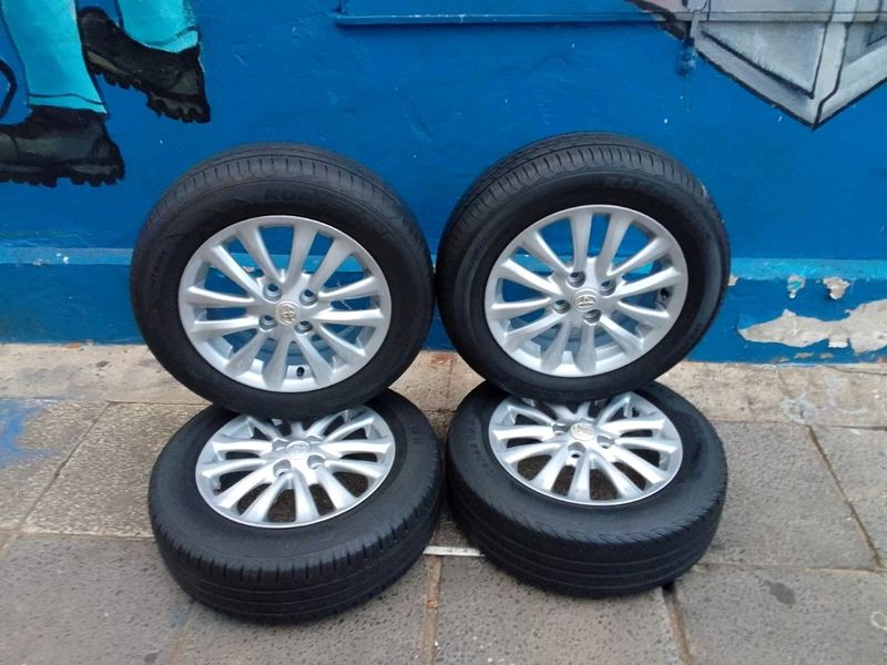 A set of 15inches original Toyota Etios mags rim 4x100 PCD with tyres