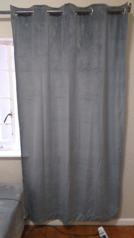 Curtains set with eyelet hanging rings.