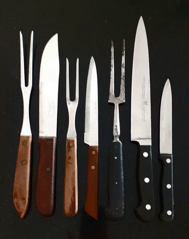 Vintage carving knives and forks. Wooden handles.