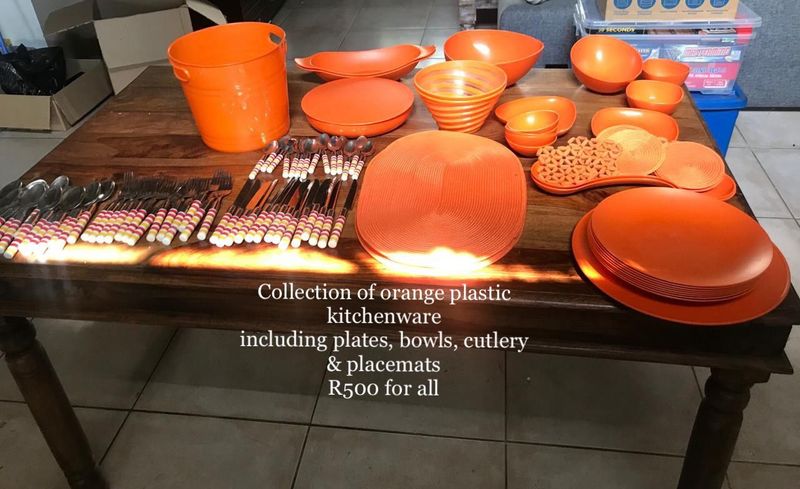 Orange table table and kitchen ware