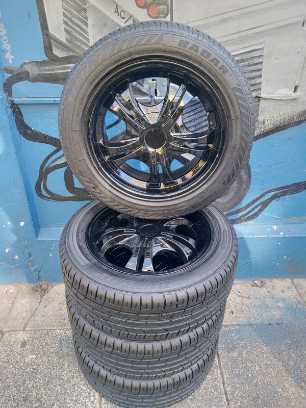 A Set of 15inch Rims And TYRES