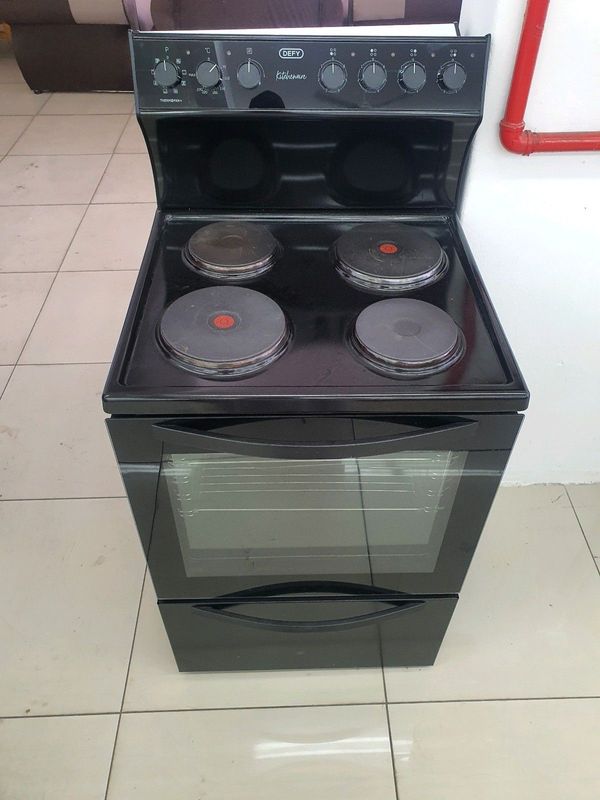 Defy as new 4 plate free standing stove