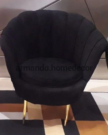 Black velvet single couch with silver legs