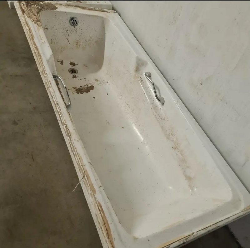 Looking to sell 2 old bath tubs. Renovating and removed from old apartment.