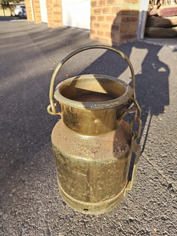 Old style copper coated milk can