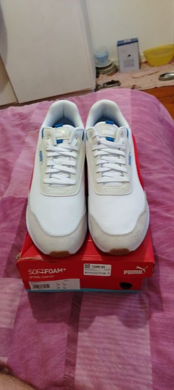 Selling my white with red puma shoes size 12