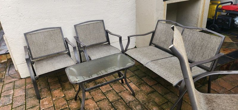 Outdoor sofa, 2 chairs and coffee table. Also selling 4 seater patio dining table and seats