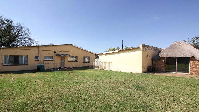 Amazing potential with spacious yard and entertainment area