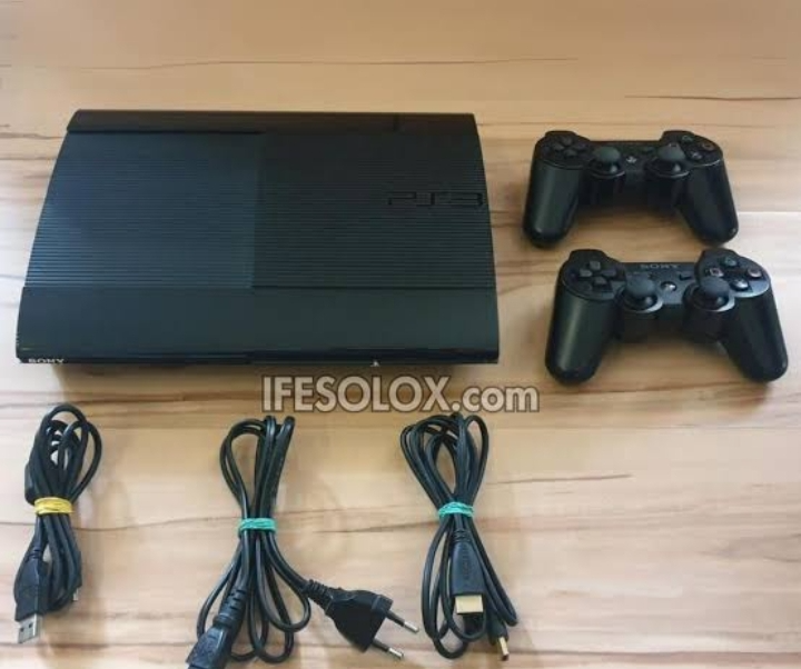 PS3 super slim,1 TB Hard drive. Comes with 2 controls and 60 games.