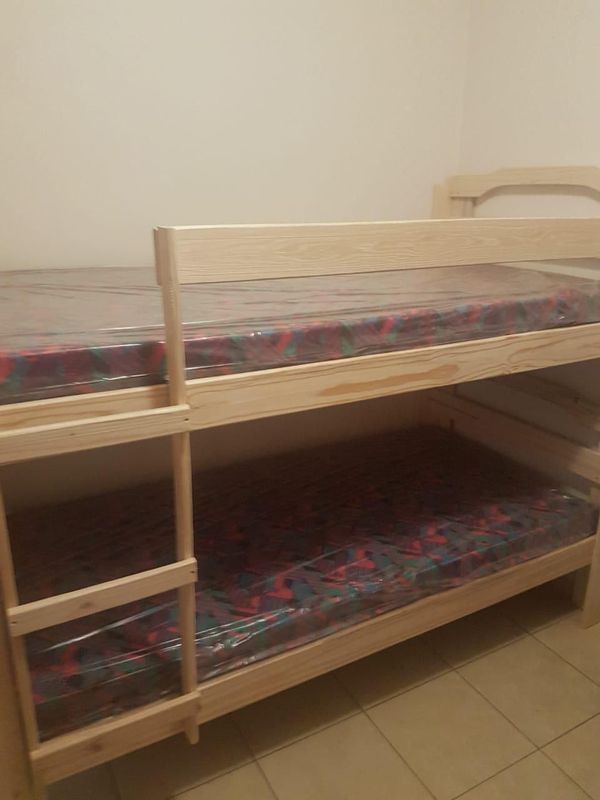 Strong double bunks with mattresses for sale