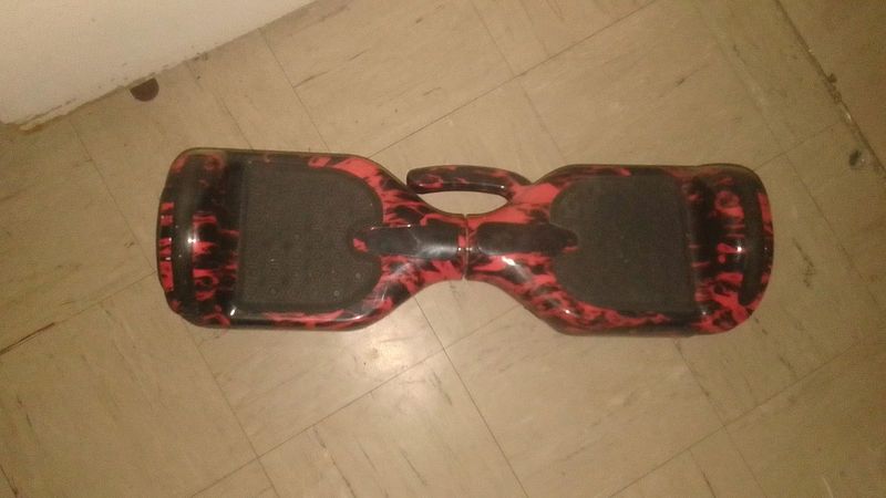 Red and black hoverboard with 5.0bluetoot