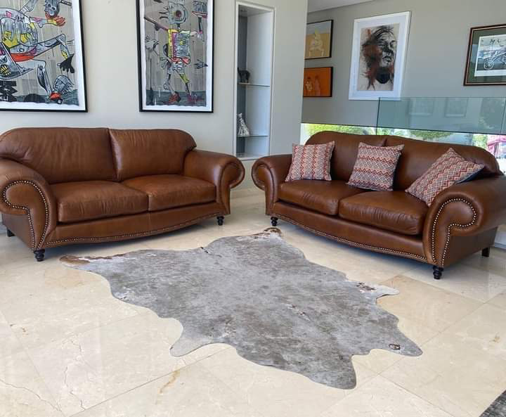 Brand New 2 piece SERENGETTI STYLE genuine leather lounge suite. (2 x 2.3m LARGE THREE SEATER SOFAS)