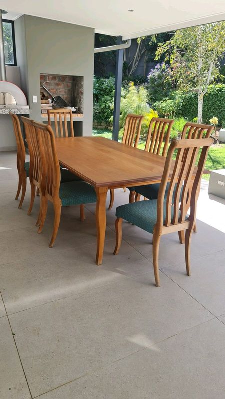 Yellow wood dining table and chairs