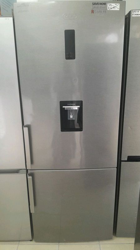 Defy top and bottom refrigerator with water dispenser