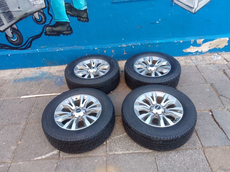 A set of 18inches original Isuzu bakkie mags 6 holes with tyres. This set are in perfect condition