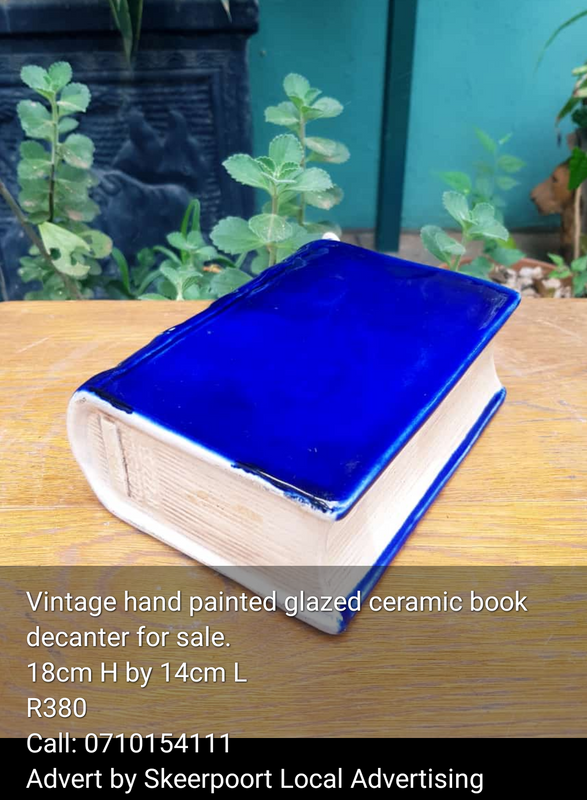 Vintage hand painted and glazed ceramic book decanter for sale