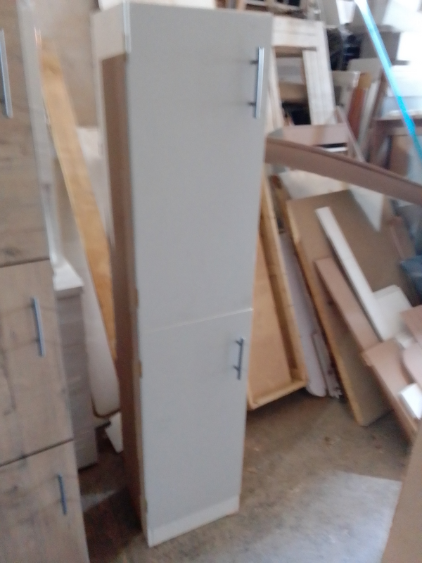 white cupboard with shelf