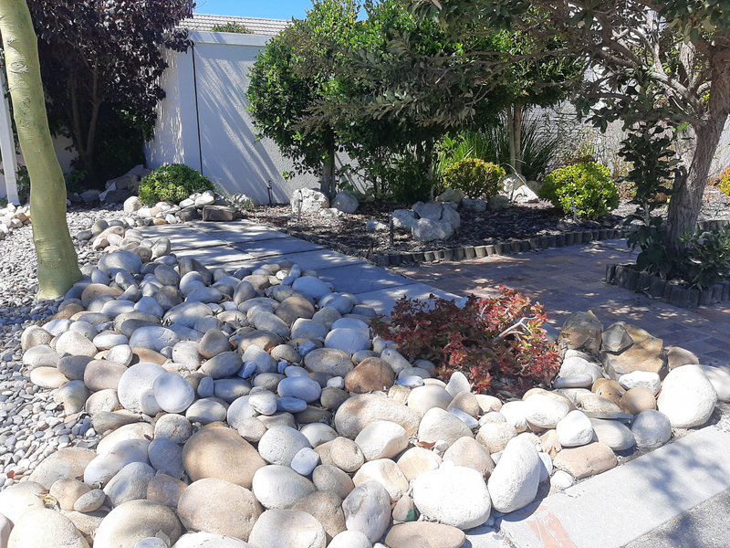 Have everyone envy your beautiful garden with Beige River Boulders from Stone and Bark