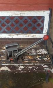 Signode seal feed strapping machine.