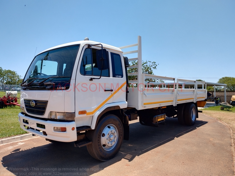 2009 - NISSAN DIESEL UD90 WITH DROPSIDE BODY