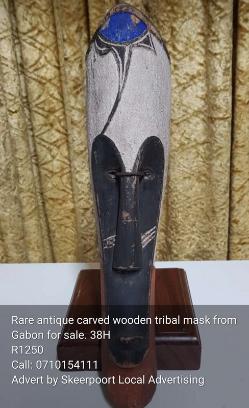 Rare antique carved wooden tribal mask from Gabon For Sale