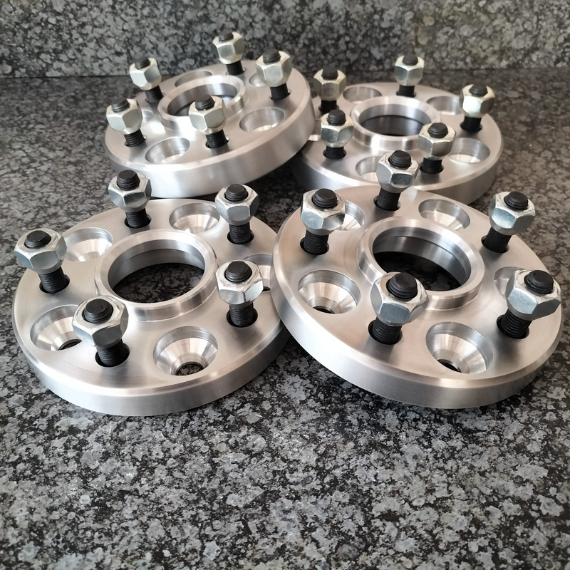 Wheel spacers and wheel adapters