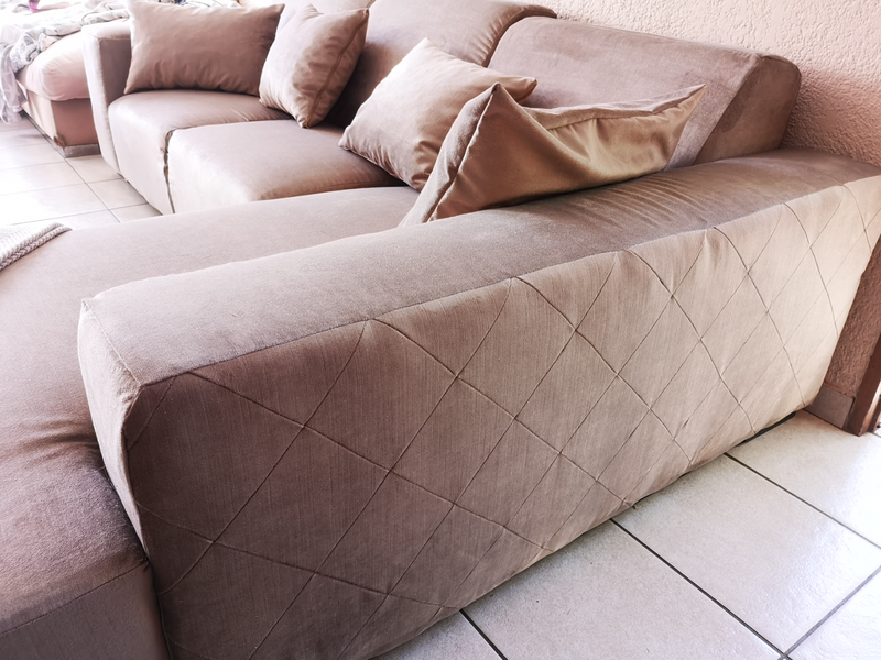 L Shape Couch with Scatters for sale.