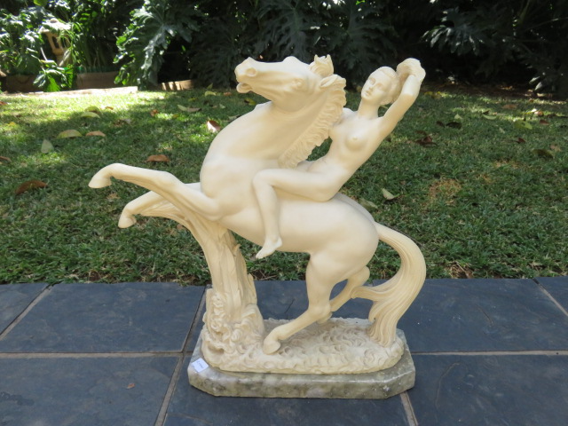 A Giannelli alabaster figurine, Nude on a Horse.