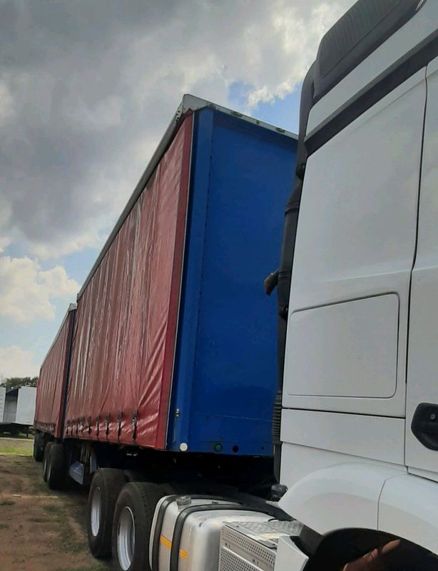 SAVE MORE WITH HENDRED CURTAIN SIDE TRAILER.