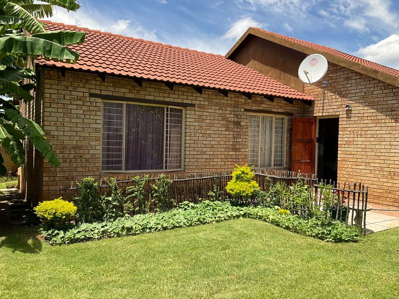 Exclusive Listing: Stunning 3-Bedroom Home with Ensuite, Double Garage, and Fruitful Garden
